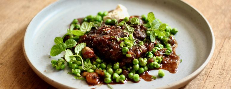 Braised Lamb Neck Rosettes with Minted Peas and Sour Cream